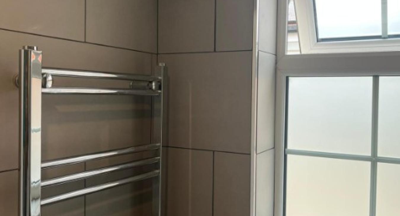 Modern Electric Towel Rail Fitting in Flitwick